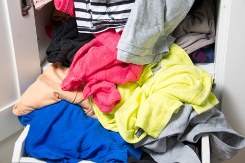 Crew loading furniture during a Brompton flat clearance